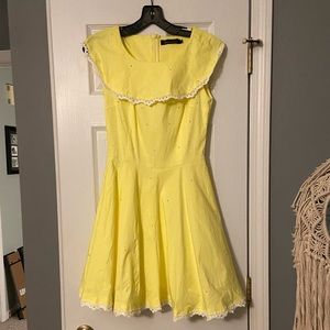 Yellow dress with headpiece. One for a competition season. In great condition.